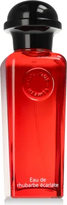 A product shot of a red perfume bottle with a black cap.
