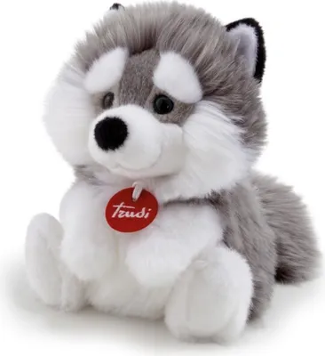 A plush toy husky dog sitting down.
