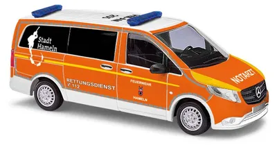 Zdjęcie produktu dla Busch 51182 – 1:87 – MB Vito karetka pogotowia ratunkowego z Hameln – nowy