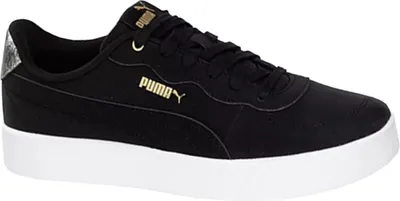 A black Puma sneaker with a white sole and gold accents.