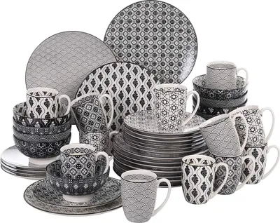 A collection of ceramic dinnerware with a geometric pattern.