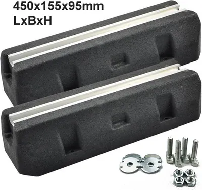 Two black bumper blocks with silver inserts, along with mounting hardware, are displayed on a white background.