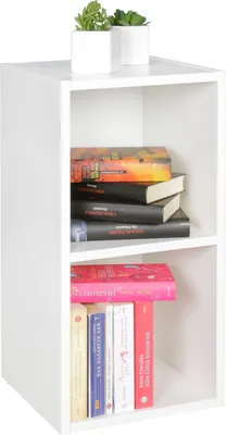 A white modular shelf unit displaying books and decorative succulents.