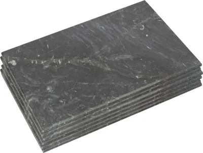 A stack of rectangular marble coasters on a white background.