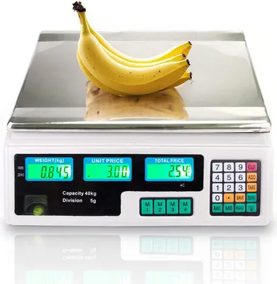 A digital scale with bananas on top, displaying weight, unit price, and total price.