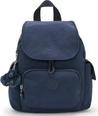 A blue Kipling backpack with a fluffy monkey charm.