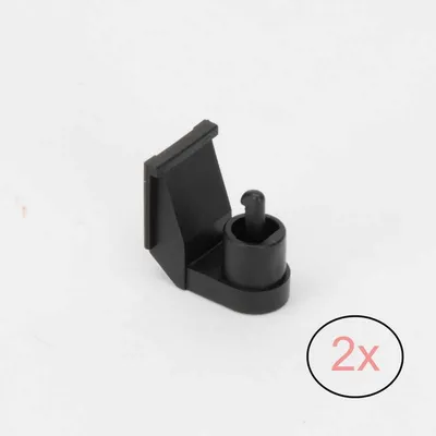 A black plastic accessory part is shown against a white background.