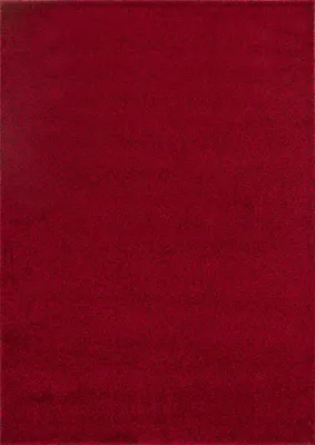 A plain, solid red rug.