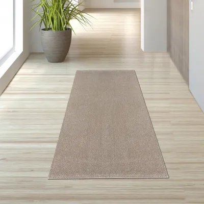 Zdjęcie produktu dla Klasyczny dywan w jednolitym wzorze w kolorze beżowym – wymiary: 80 x 150 cm