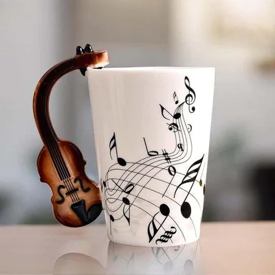 Productafbeelding van Keramische koffiekop met vioolvormige handgreep, 250 ml, muziekthema