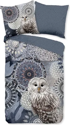 A top-down view of a bedding set with a blue and gray mandala and owl pattern.