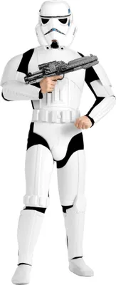 A person dressed in a Star Wars Stormtrooper costume holding a toy blaster.
