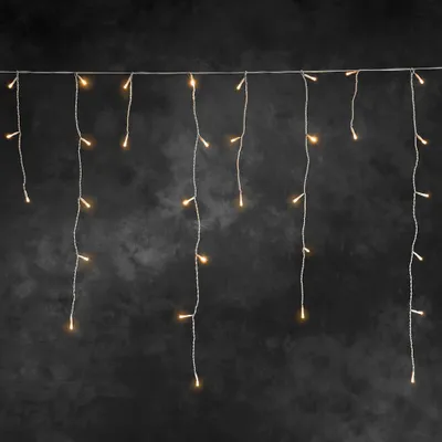 Produktbild von Konstsmide - LED Eisregen Lichtervorhang, 96 bernsteinfarbene Dioden, 24V Außentrafo, weißes Kabel  - 2743-802