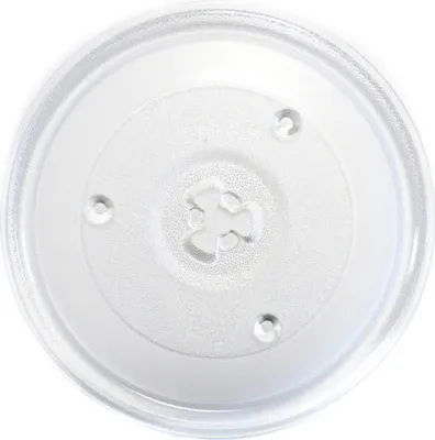 A clear, top-down view of a glass microwave turntable plate on a white background.