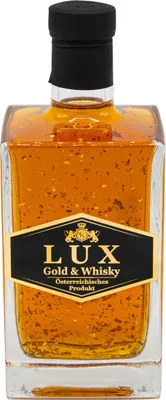 Produktbild von Lux Gold & Whisky. Feinster Whisky verfeinert mit 24-karätigem Blattgold.