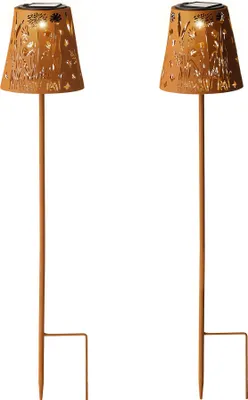 Two solar garden lights with stakes, shown against a white background.