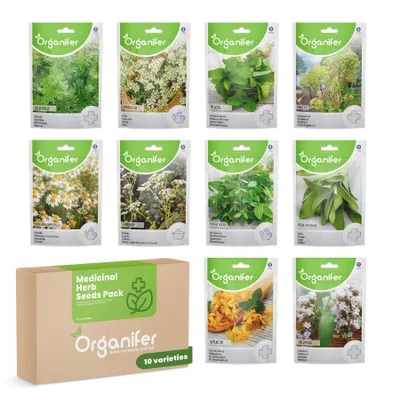 A collection of Organifer medicinal herb seed packets arranged around a box of the same brand.