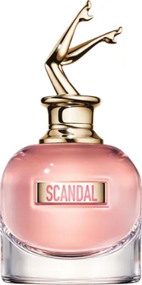 A perfume bottle with a distinctive gold cap shaped like legs.