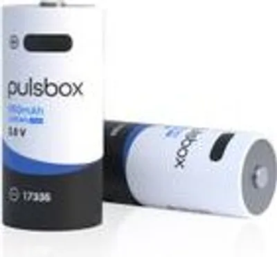 Two batteries are shown against a white background. One battery stands upright, and the other lies horizontally.