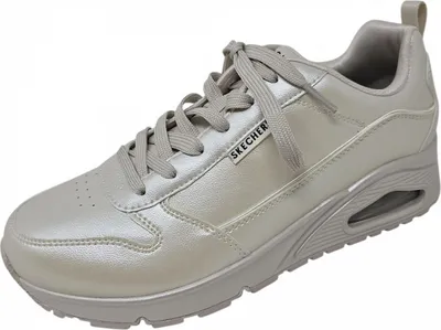 A single beige Skechers sneaker is shown from a side-angle against a white background.