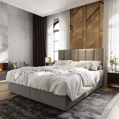 A bedroom scene featuring a large bed with a headboard, pillows, and bedding. The room has a modern aesthetic with textured walls and wooden accents.