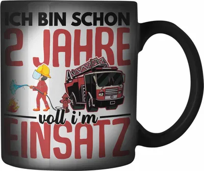 Produktbild von Trendation - 2. Geburtstag Geschenk Jungs Feuerwehr Farbwechsel Zauber-Tasse Geschenke Zubehör Lustig Kinder Geburtstag Spruch Ich Bin 2 (Schwarz)