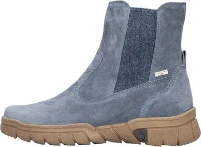 A side view of a blue suede Chelsea boot with a tan sole.