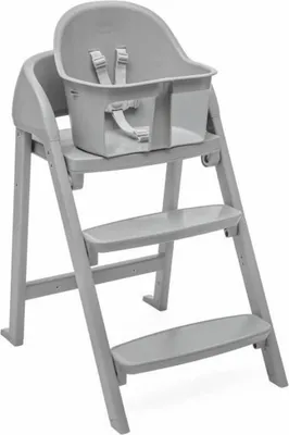 A gray high chair with a tray and safety straps, shown against a white background.