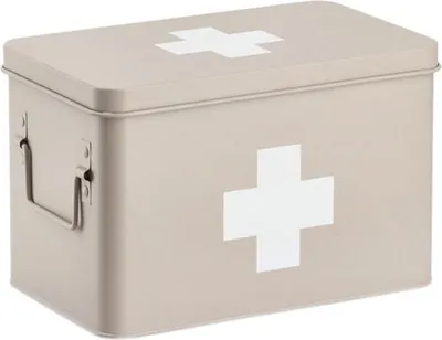 A beige metal medicine box with a white cross symbol on the lid and front.