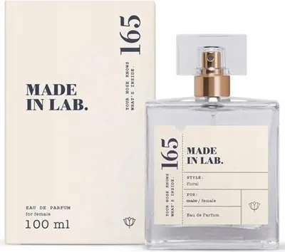 A perfume bottle and its packaging are displayed side-by-side against a white background.