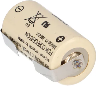 A close-up studio shot of a single battery with a metal holder.