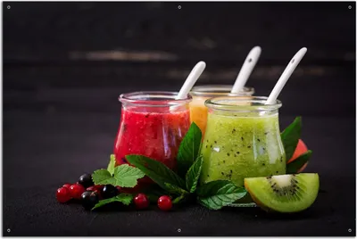 Produktbild von Wallario Outdoor-Poster für Garten oder Balkon, Motiv Bunte Smoothies in grün und rot, in ca. 61 x 91,50 cm