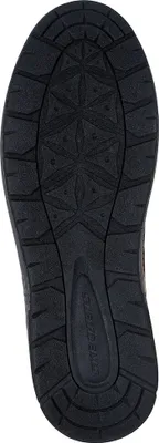 The image shows the sole of a black shoe.