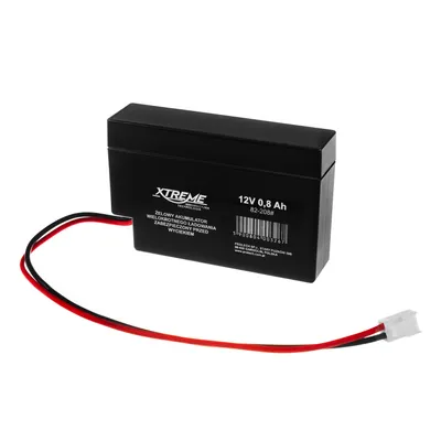 A black battery with red and black wires attached, shown on a white background.