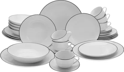 A collection of white ceramic dishes and cups with black trim, arranged on a white background.
