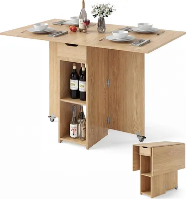 A wooden dining table with drop-leaf extensions, storage compartments, and wheels, set up with place settings.