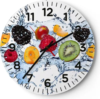 A round wall clock with a design featuring various fruits splashing in water.