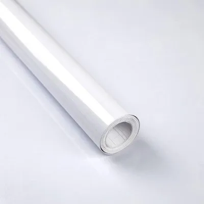 Obrázok produktu pre Samolepiaca® biela dekoratívna fólia Unyqoos s vysokým leskom na nábytok a steny, 30 x 300 cm