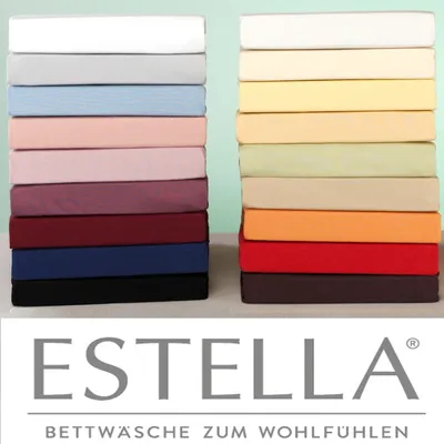 Stacks of colorful fitted sheets and a brand logo with text.