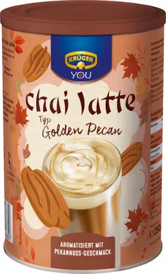 A can of Krüger Golden Pecan Chai Latte with autumn-themed graphics.