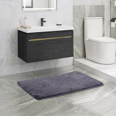 Produktbild von Unyqoos® Badematte 50 x 80 cm für Badezimmer – weiche Mikrofaser, hochsaugfähig & rutschfest, maschinenwaschbar, in verschiedenen Farben und Größen