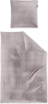 A flat lay of a pillowcase and a duvet cover, both in a light gray/pinkish hue with a subtle textured pattern, presented on a white background.