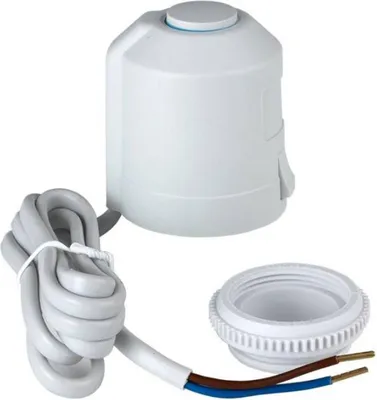 A white electric actuator for underfloor heating and a white adapter ring are shown against a white background.