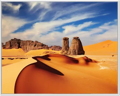 Produktbild von Wallario Wandbild Felsen und Sand in der Sahara Wüste, Größe: 40,30 x 50,30 cm, Poster mit weißem Aluminiumrahmen