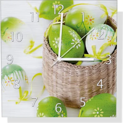 Produktbild von Wallario Design Wanduhr Ostergruß - bunte bemalte Ostereier in einem kleinen Körbchen aus Aluverbund, Größe 30 x 30 cm