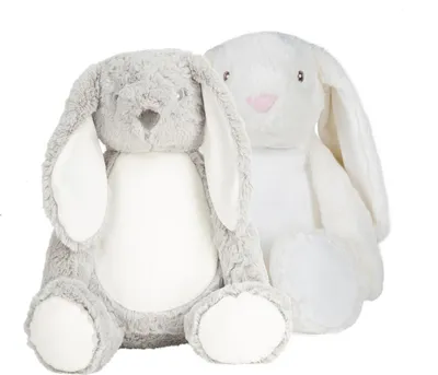 Two plush bunny toys are shown against a white background. One is gray and the other is cream-colored.