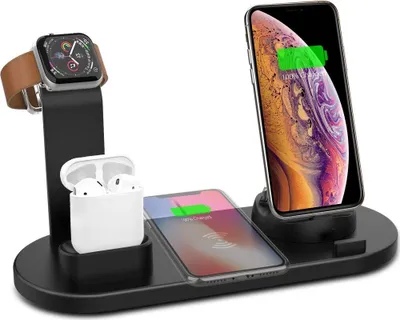 A black charging stand holding an Apple Watch, AirPods, and two iPhones.