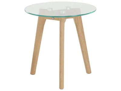 A round glass-top side table with a wooden base.