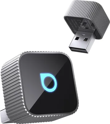 A product shot of two silver electronic devices, one with a blue illuminated logo, against a white background.