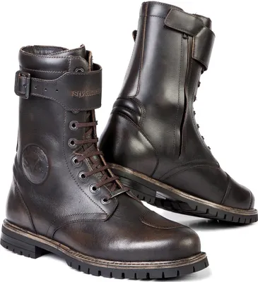 A pair of brown leather motorcycle boots shown against a white background.